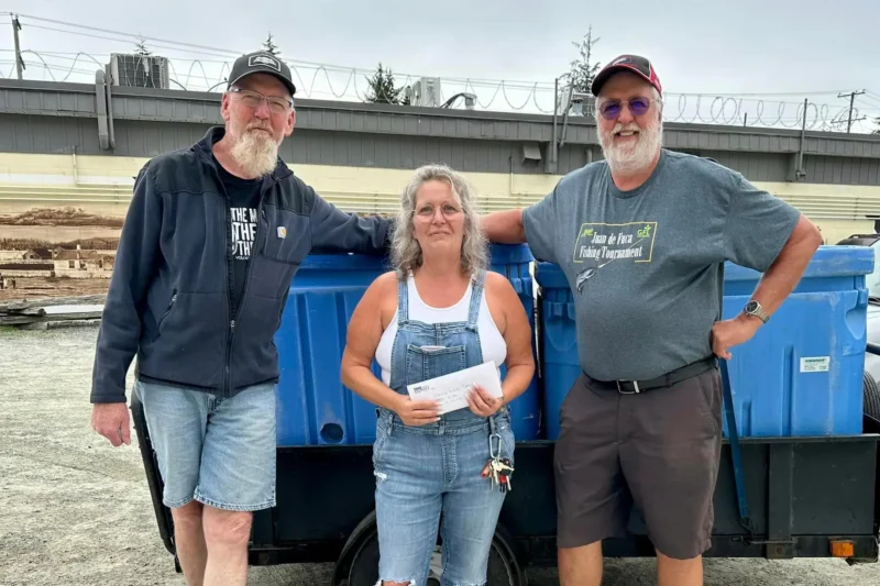 Derby donates fish and funds to Sooke Food Bank